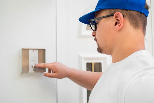 Electrician installing and testing a residential electrical system